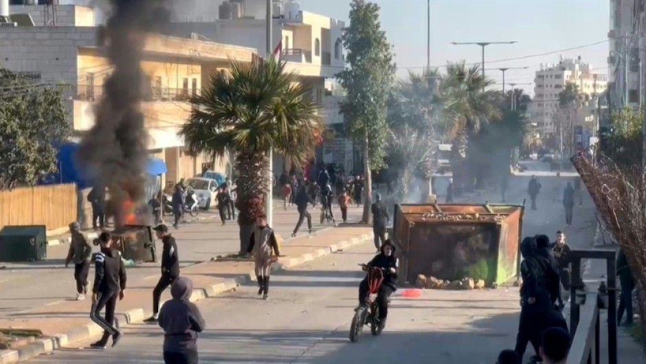 Palestinians protest in West Bank's Beitunia as Israel delays prisoner release