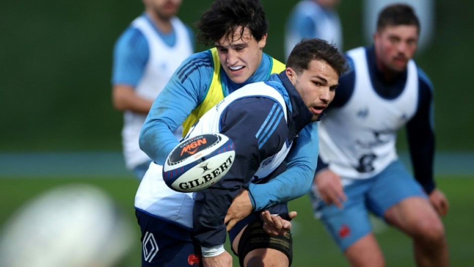 Antoine Dupont (R) made his Test deut in 2017