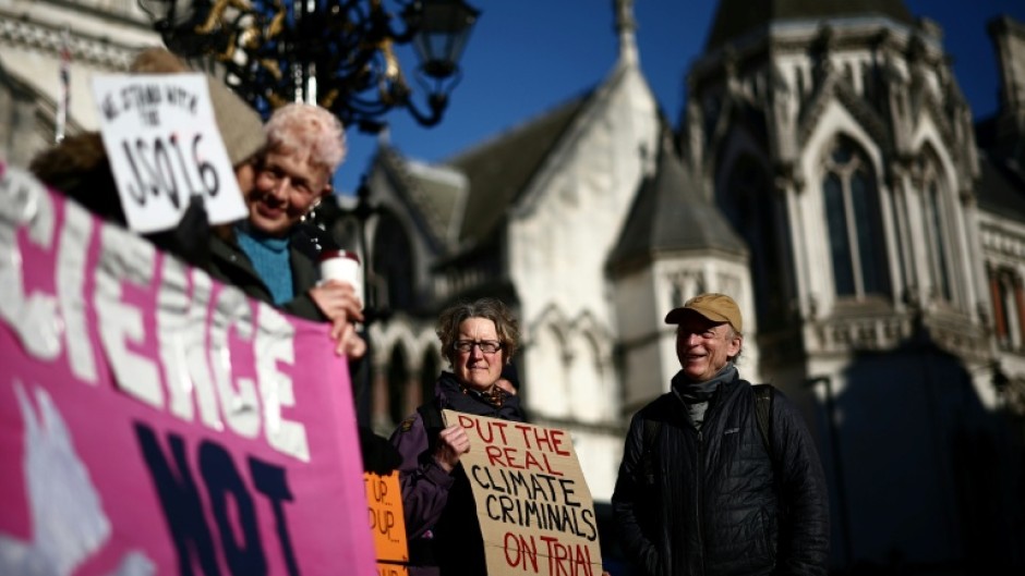 Protesters outside the Royal Courts of Justice in central London to support 16 Just Stop Oil activists