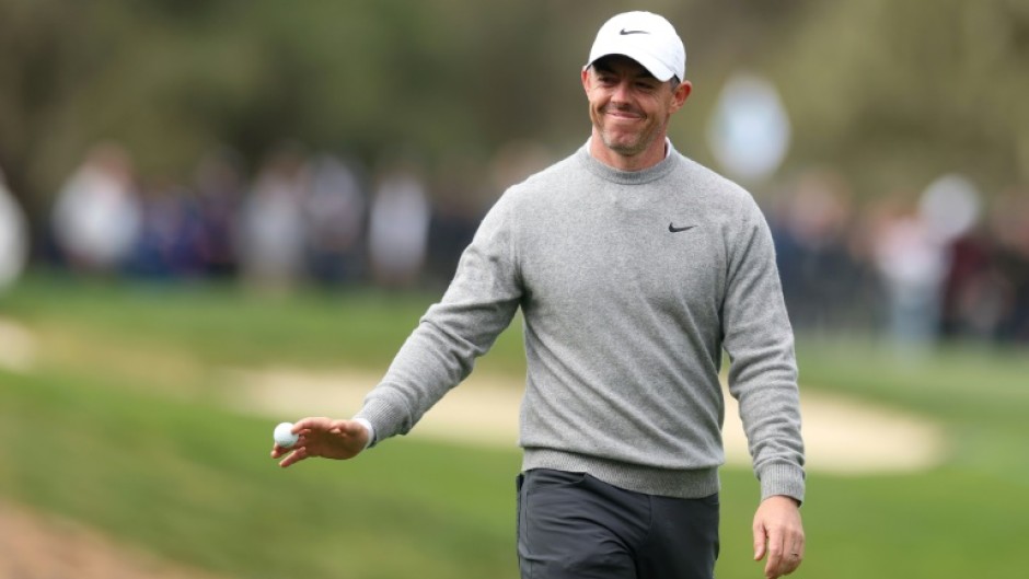 Rory McIlroy acknowledges the crowd after his opening round hole-in-one at the PGA Tour's Pebble Beach Pro-Am tournament in California on Thursday