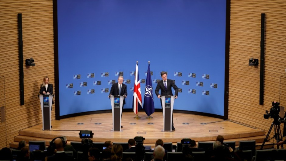 Britain's Prime Minister Keir Starmer (L) met NATO Secretary General Mark Rutte before a dinner with EU leaders