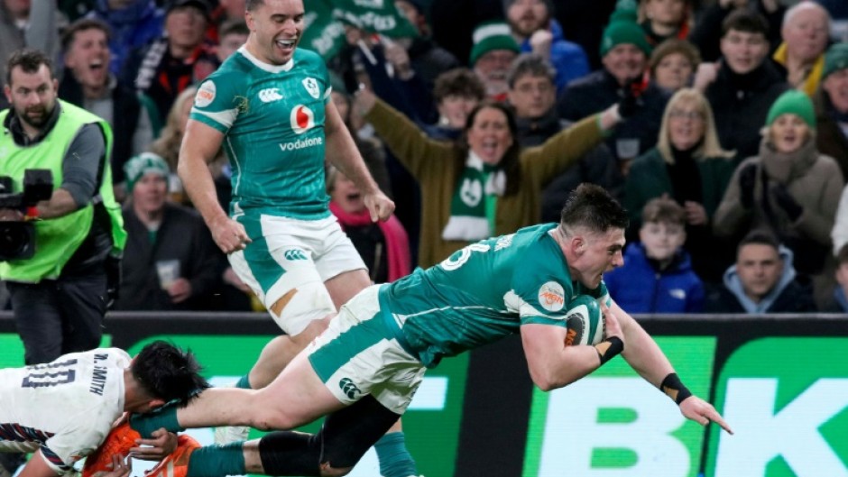 Dan Sheehan scores the fourth of Ireland's tries against England