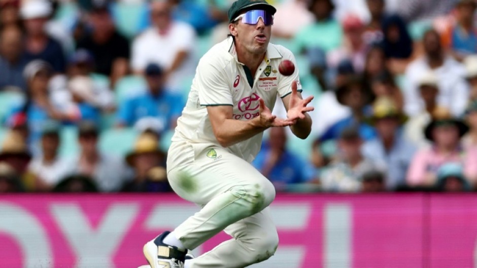 Pat Cummins takes a catch in the recent Test series against India