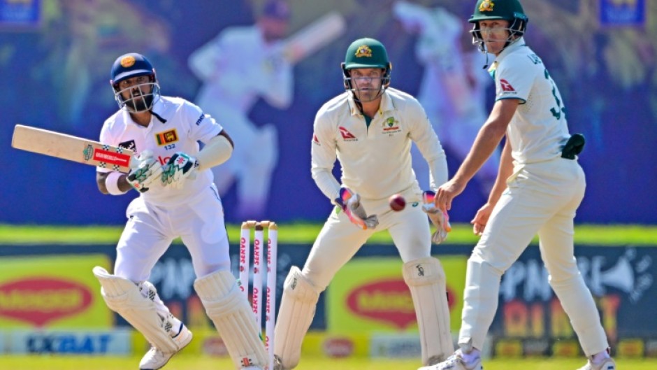 Sri Lanka's Kusal Mendis (L) plays a shot during the second day of second Test 
