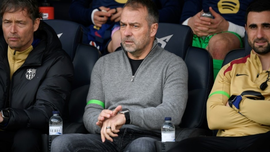 Barcelona coach Hansi Flick (C) said his team would not hide behind excuses and complaints this season