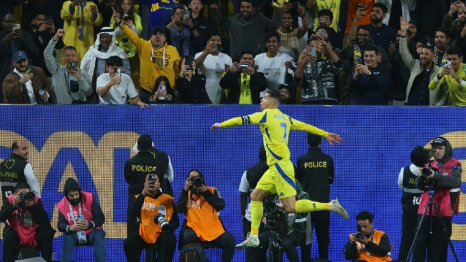 Al Nassr's Portuguese forward Cristiano Ronaldo celebrates scoring in the Saudi Pro League 