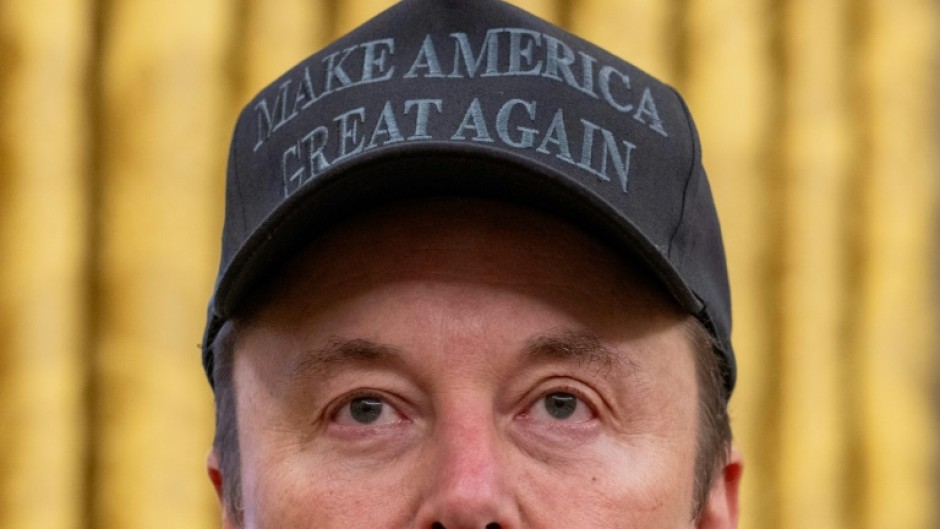 Elon Musk, seen here in the Oval Office on February 11, has hired a team of unvetted and inexperienced outsiders to dive into sensitive US government systems