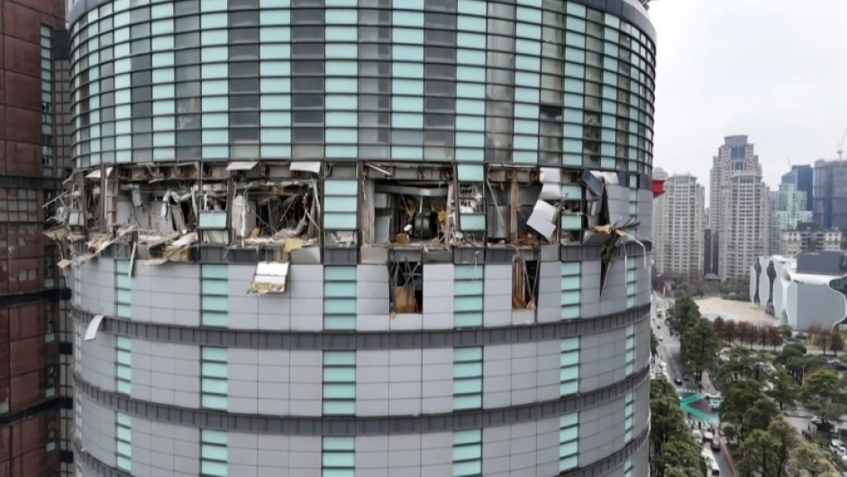 A suspected gas explosion affected several floors of a Taiwan department store, authorities said, and sent debris raining onto the street below