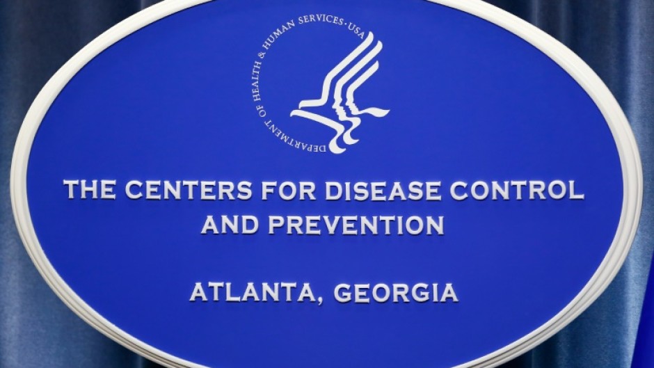 A sign with the logo for the Centers for Disease Control and Prevention headquarters in Atlanta, Georgia