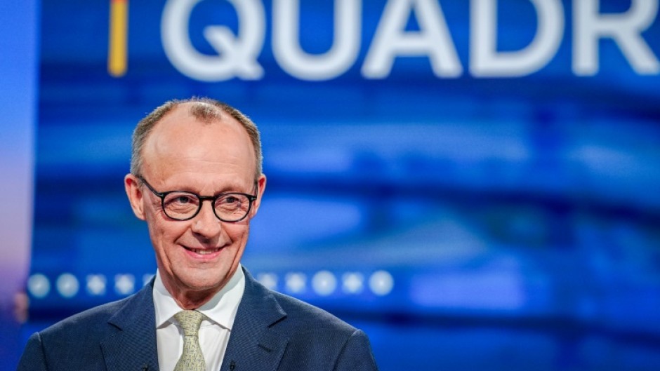 Friedrich Merz, main candidate of the Christian Democratic Union (CDU), in the TV studio holding Sunday's four-way debate