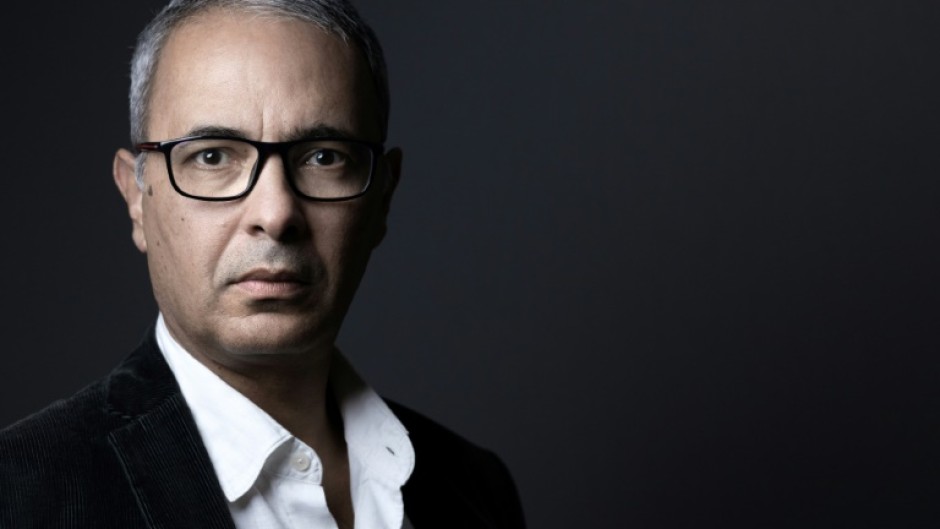 Writer Kamel Daoud is being sued in France for invasion of privacy by an Algerian survivor of a 1990s massacre in the North African country