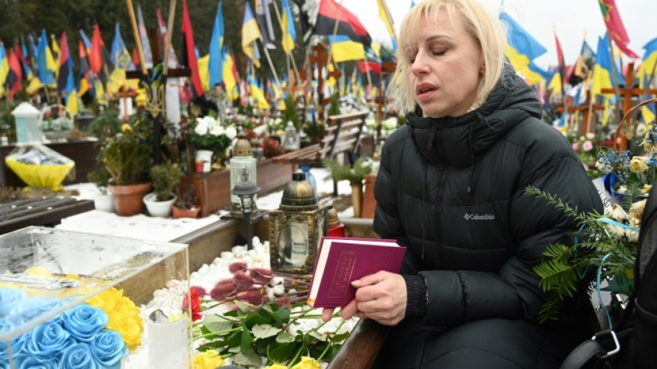 Natalia reads poems to her dead husband in Lviv