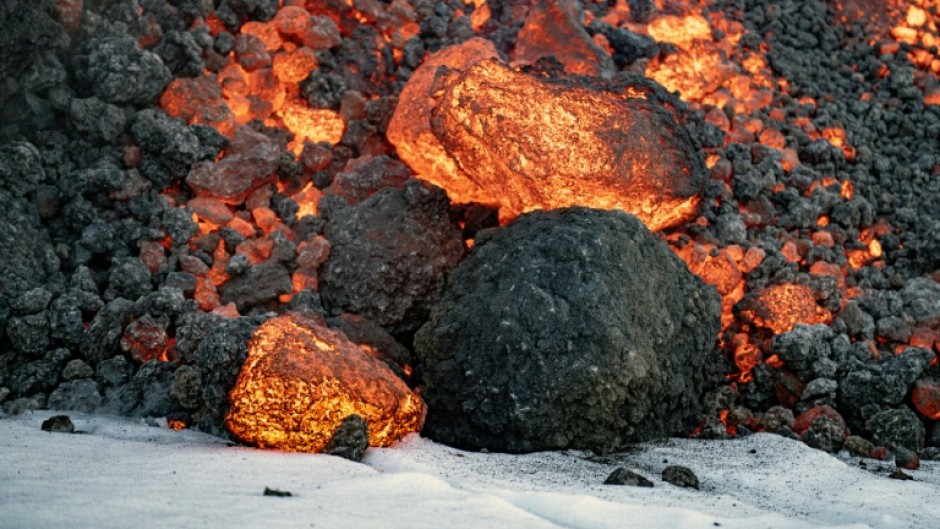Seeping lava and gleaming white snow has proven irresistible to tourists at Mt. Etna. 