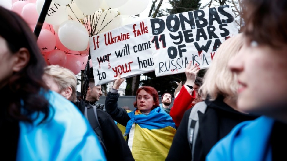Around 300 people started at a statue of Saint Volodymyr in west London and marched towards the Russian embassy