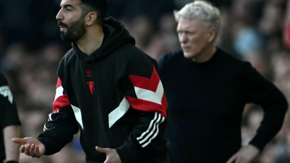 Ruben Amorim (left) believes Man Utd just have to "survive" a dreadful season