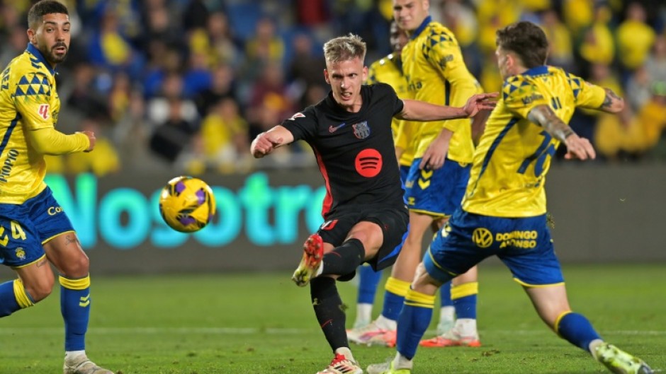 Barcelona playmaker Dani Olmo (C) broke the deadlock with a fine finish against Las Palmas