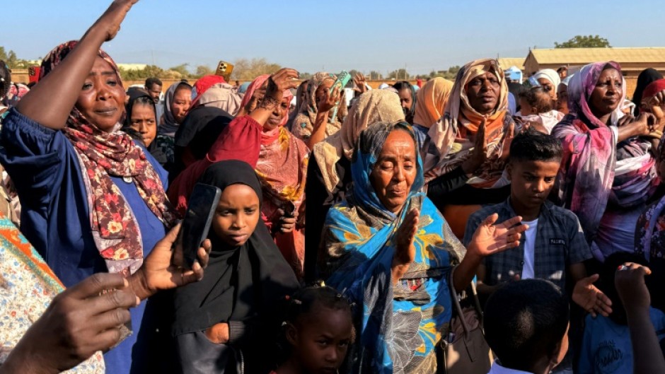Displaced people return to Wad Madani in Al-Jazira state, after the city was retaken by the army