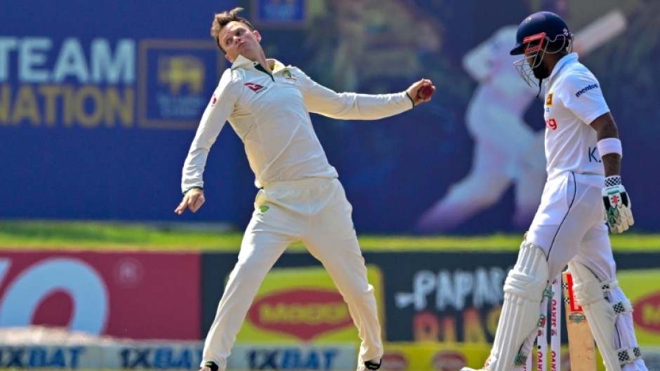 Australia's Matthew Kuhnemann (L) took 16 wickets in the series win over Sri Lanka which resulted in his action being reported