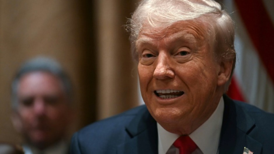 US President Donald Trump speaks during a cabinet meeting at the White House