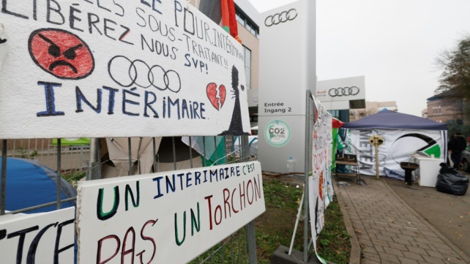 Workers launched a prolonged strike to try to prevent the closure of Audi's plant in Brussels