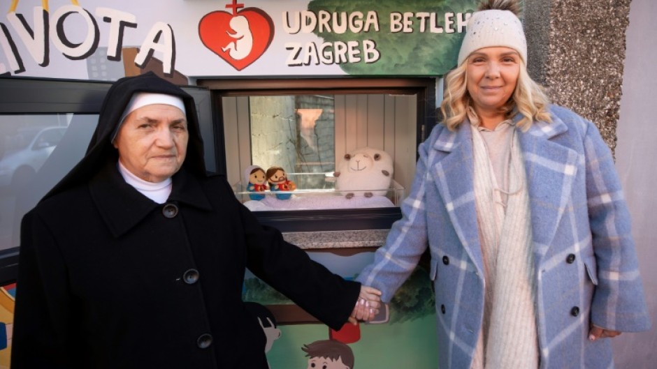 'Baby box': Alberta Vrdoljak from the Betlehem Zagreb group with a nun in front of the 'Window of Life' in the Croatian capital