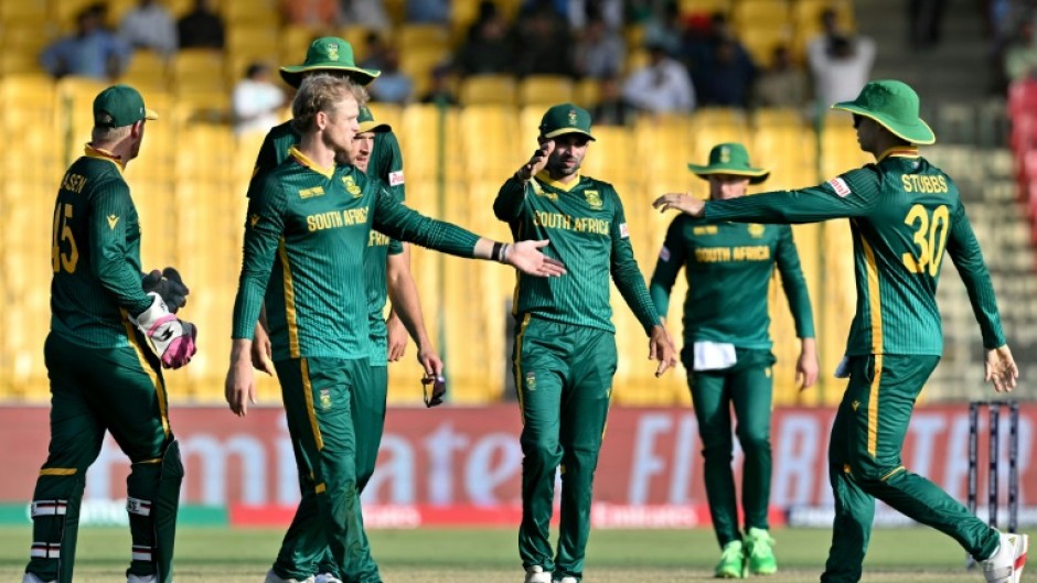 South Africa players celebrate in Karachi