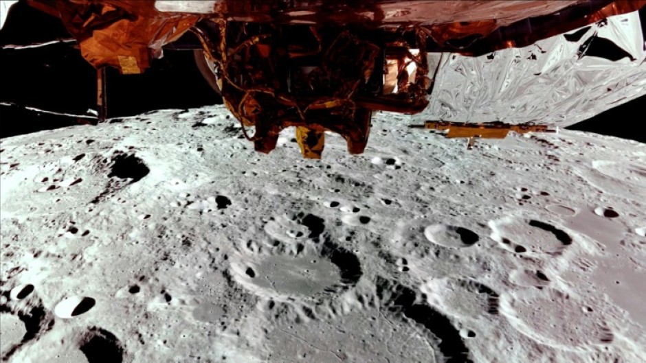 This still image taken from a February 24, 2025, video released by Firefly Aerospace shows Firefly's Blue Ghost lander on its third lunar orbit near the far side of the Moon and a top-down view of Blue Ghost