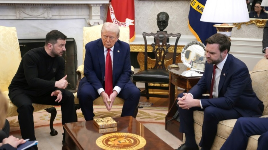 US President Donald Trump (C) and Vice President JD Vance (R) meet with Ukrainian President Volodymyr Zelensky (L) in the Oval Office on February 28, 2025