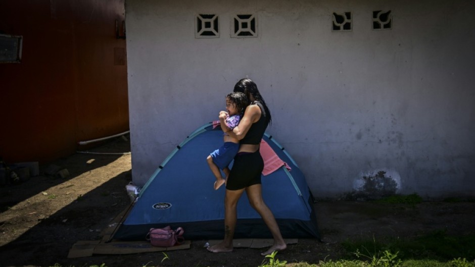 The homebound migrants have already made the arduous journey back from Mexico on foot and by bus