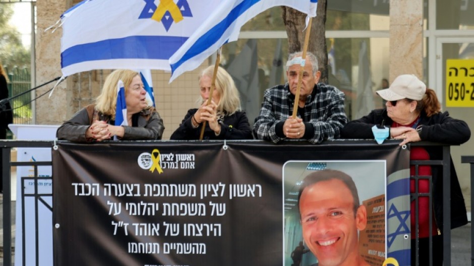 Mourners wait outside the morgue in Rishon LeZion in central Israel for the funeral procession of Ohad Yahalomi (pictured), one of the Israeli hostages taken captive by Palestinian militants in the October 2023 attacks