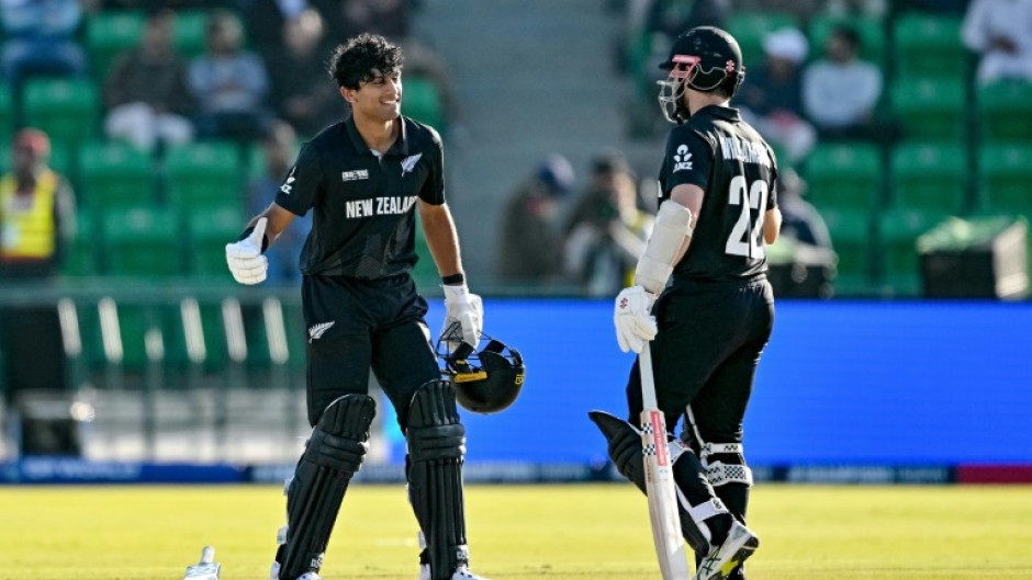 Rachin Ravindra (L) and Kane Williamson led New Zealand to an imposing 362-6 in their Champions Trophy semi-final against South Africa