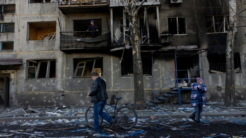 In Dobropillia, AFP saw charred residential buildings, flattened market stalls and evidence of cluster bomb damage