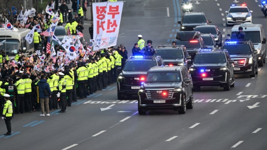 Yoon drove to the presidential residence after his release, and greeted the hundreds of cheering supporters outside