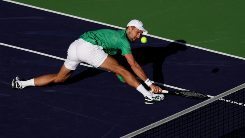 Serbia's Novak Djokovic stretches for a backhand in his shock second-round loss to Botic van de Zandschulp of the Netherlands at Indian Wells