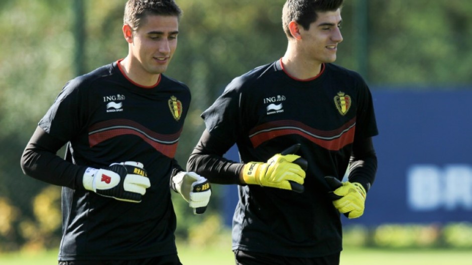 Koen Casteels (L) has retired from international football following the likely return to the Belgium national team set-up of Thibaut Courtois (R)