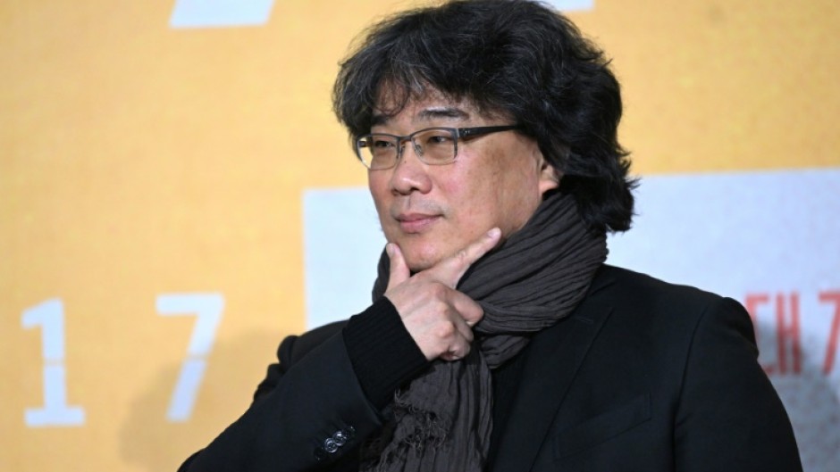 South Korean director Bong Joon-ho poses  during a press conference in Seoul to promote his new film 'Mickey 17,' a dark comedy 