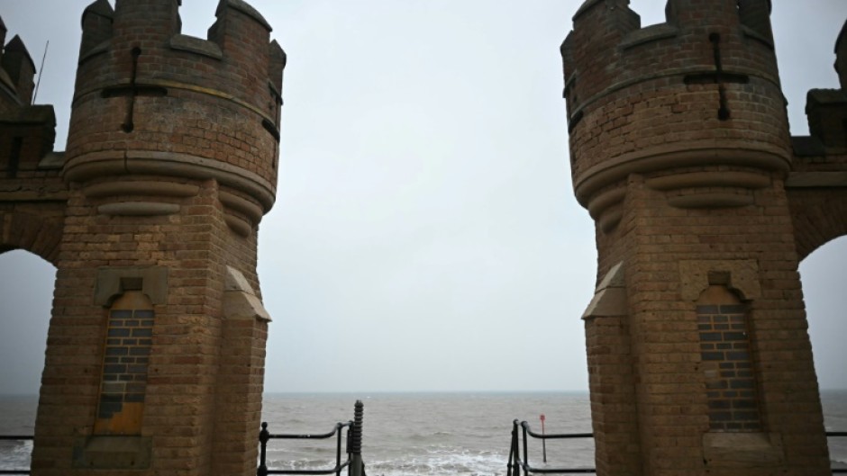 View of the North Sea between the turrets of the entrance to the old pier in Withernsea, on the east coast of England near where a collision between a tanker and a cargo ship caused multiple explosions