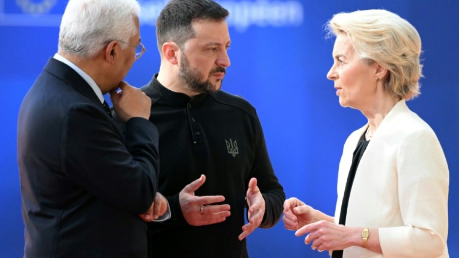 European Council President Antonio Costa, left, and European Commission President Ursula von der Leyen with Ukraine's President Volodymyr Zelensky at an EU summit