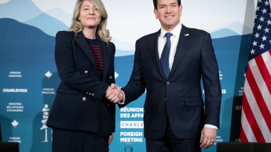 Canadian Foreign Minister Melanie Joly and US Secretary of State Marco Rubio shake hands ahead of a G7 meeting of foreign ministers in Quebec