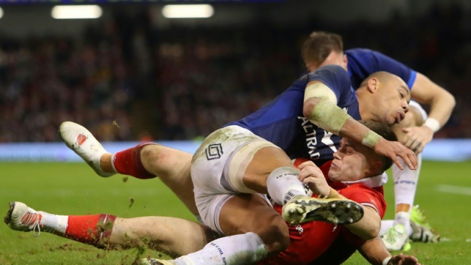 Positional switch: Joe Roberts (C) has been moved from centre to wing for Wales' Six Nations match against England in Cardiff 