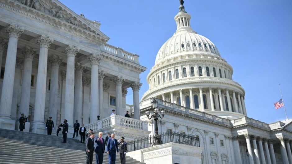 Spending cuts pressed by US President Donald Trump angered Democrats, who ultimately backed down from their threat to block the government funding bill