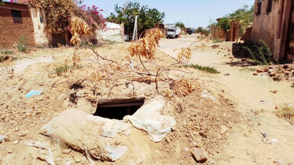 Desperate for safety from bombardment of Sudan's besieged city of El-Fasher, Darfur, residents have built makeshift bunkers