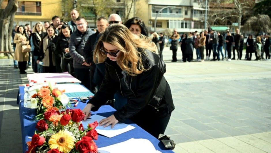 A crowd gathered to sign a book of condolences in Kocani on Monday