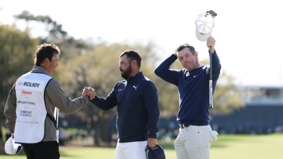 Rory McIlroy celebrates after clinching a playoff victory at The Players Championship in Florida on Monday
