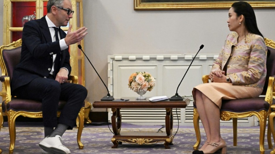 Formula One CEO Stefano Domenicali (L) held talks  with Prime Minister Paetongtarn Shinawatra over Thailand possibly hosting a grand prix