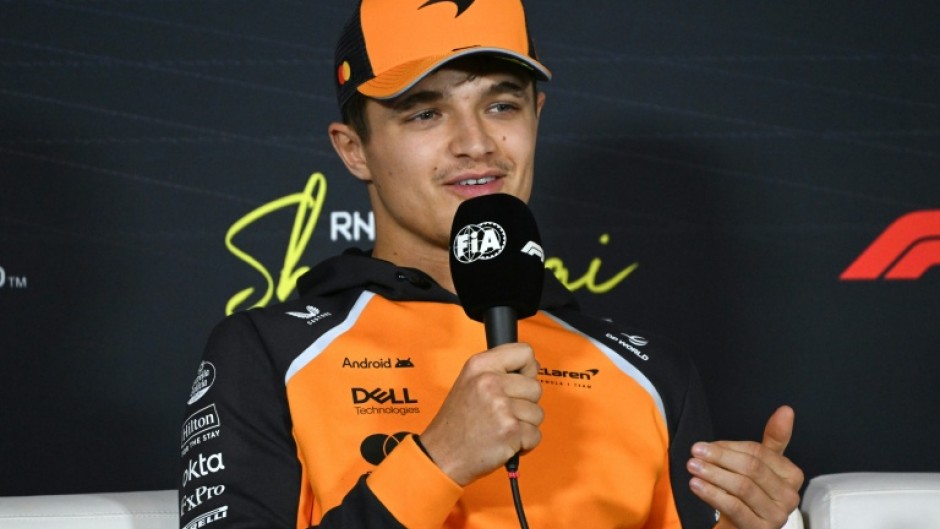 McLaren's Lando Norris talks to reporters ahead of the Chinese Grand Prix at the Shanghai International Circuit