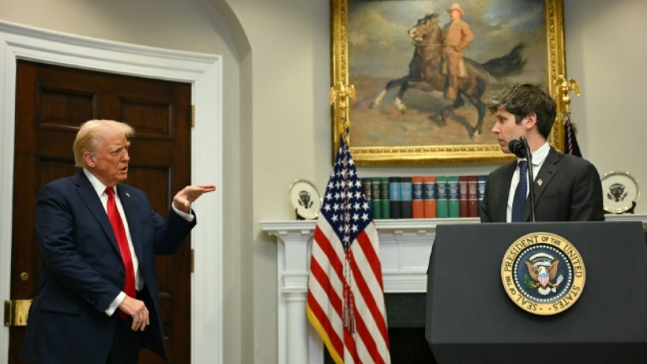 US President Trump gestures as CEO of Open AI Sam Altman speaks at the White House in January