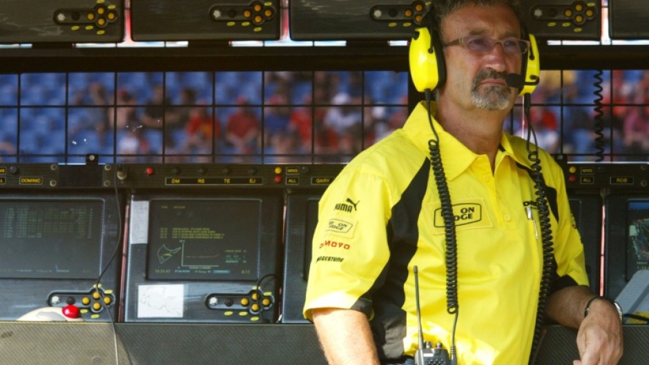Eddie Jordan on the pit wall of the Hockenheim racetrack in 2003