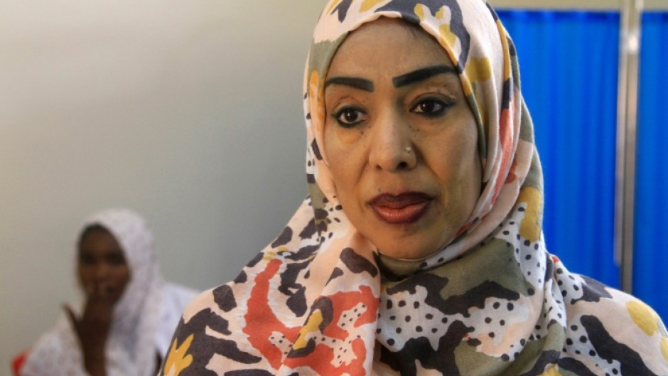 The director of the reopened Saudi maternity hospital in Omdurman, Dr. Safaa Ali, has not seen her family since they fled to Egypt when war broke out nearly two years ago.