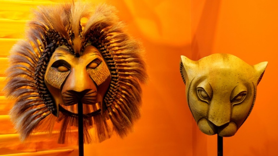 Foreign visitors often visit New York's Broadway theater district to see shows such as 'The Lion King' -- masks from the show are on display at the Museum of Broadway in Times Square